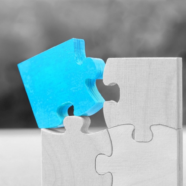 puzzle with blue cyan piece
