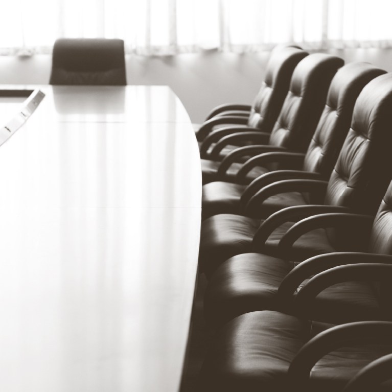 board chairs around a table