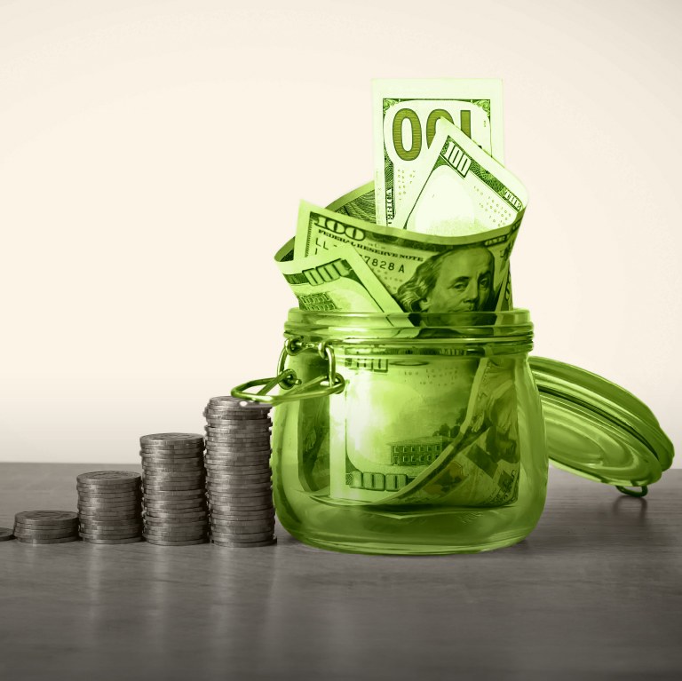 green jar with money