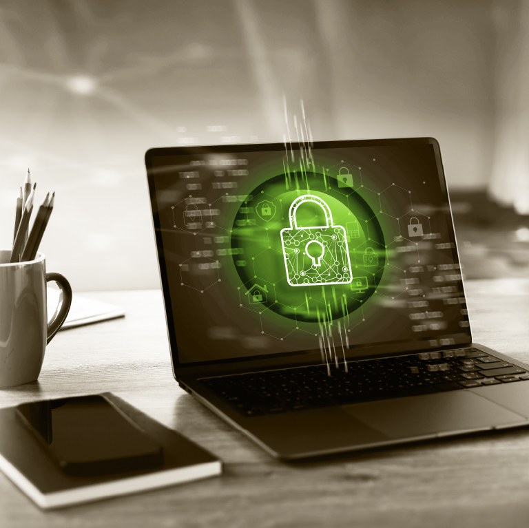 computer with cybersecurity shield
