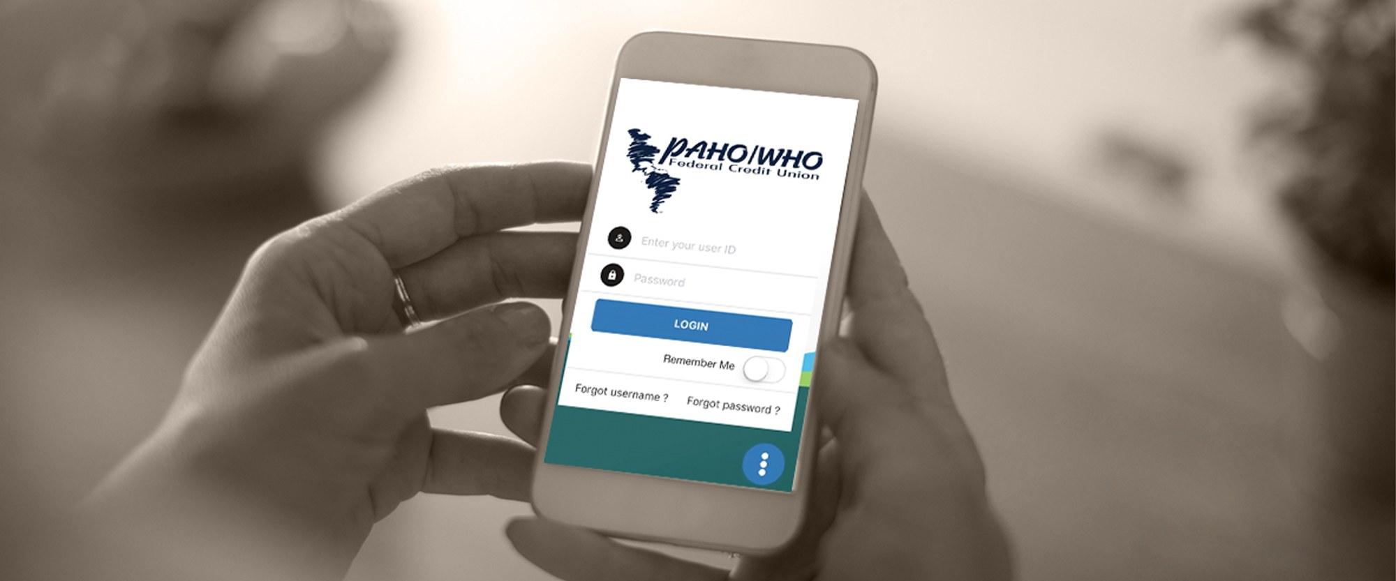 Person logging into PAHO/WHO Credit Union on mobile device