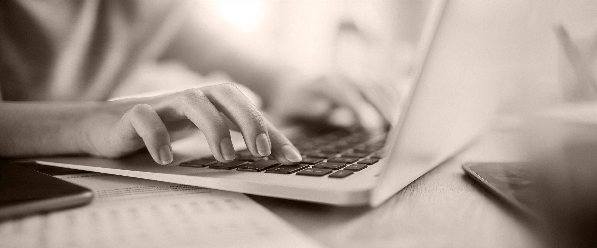 Person typing on computer