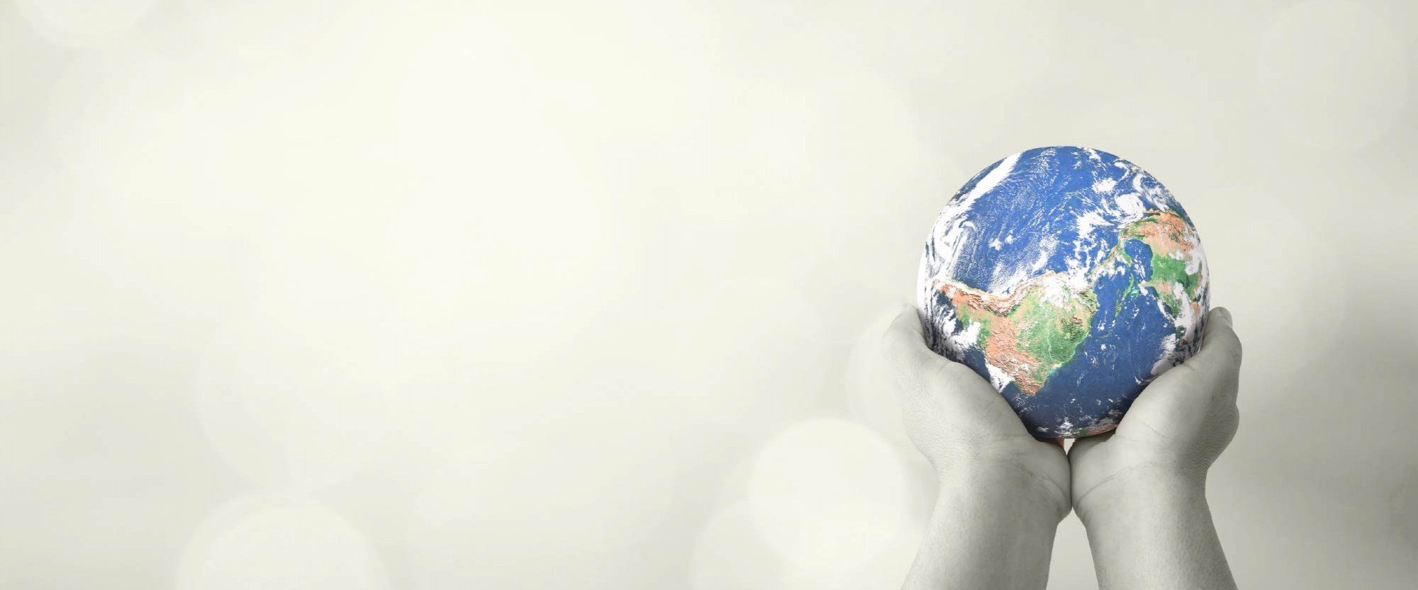 hands holding the globe of earth